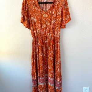 Orange patterned peasant midi dress